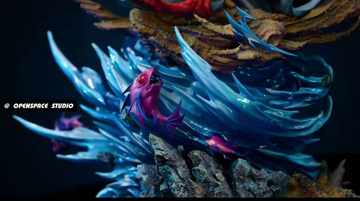 Dettaglio degli effetti d'acqua blu, dei pesci e della base rocciosa del diorama